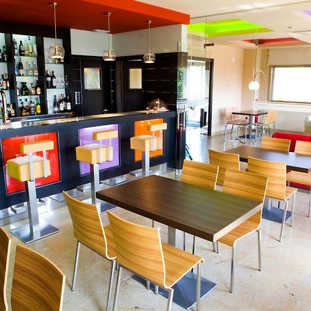 Royal Nayef Hotell Portonovo Restaurant bilde